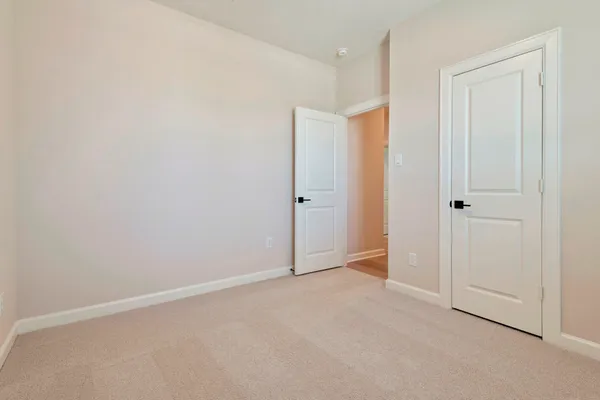 an empty room with an entryway
