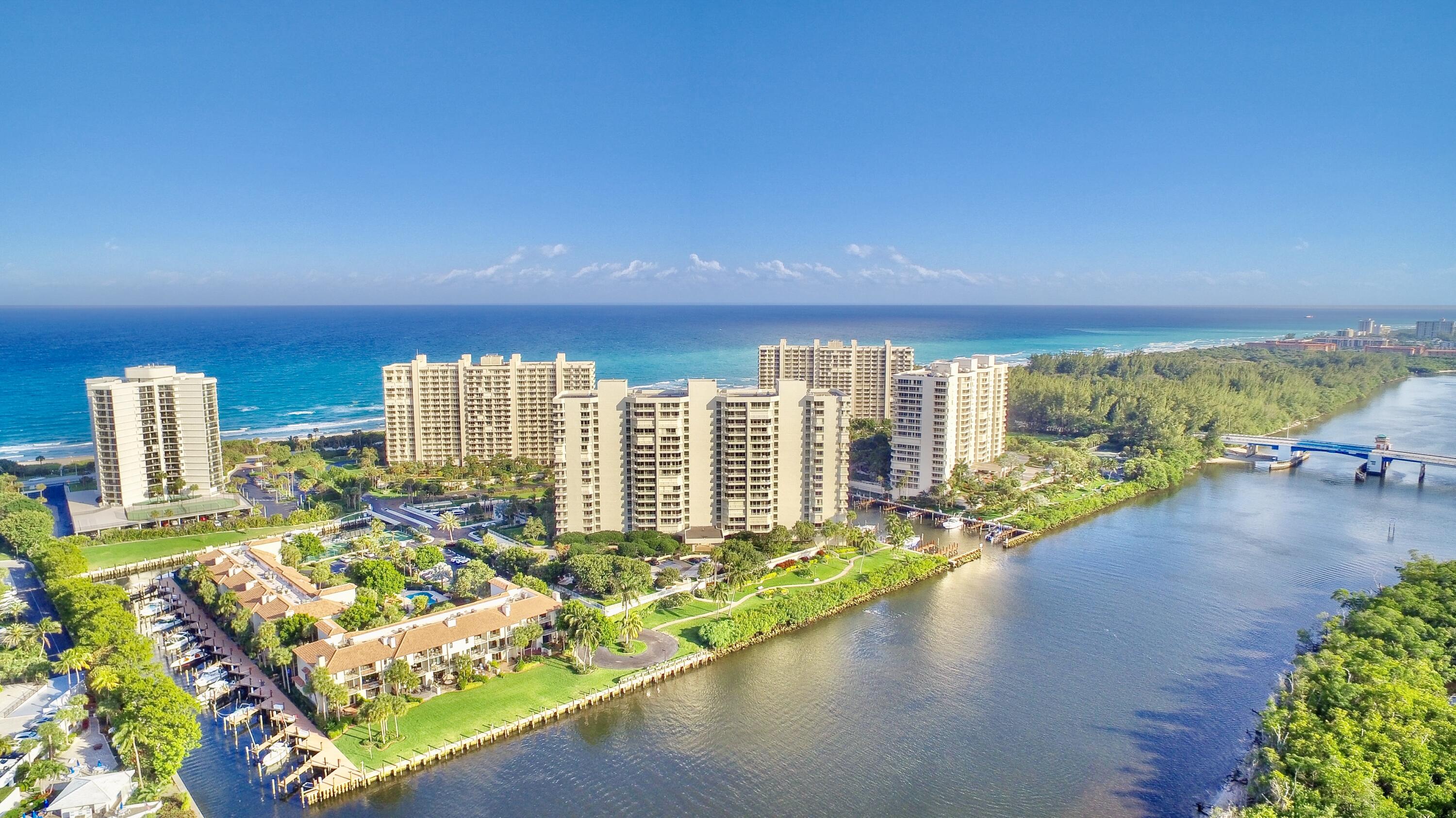 4001 North Ocean Boulevard, Unit B1201 Boca Raton, FL 33431 - Photo 1 of 42 a view of a city from a dining room with furniture