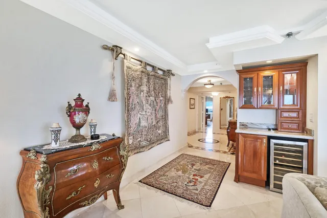 a living room with furniture and a table