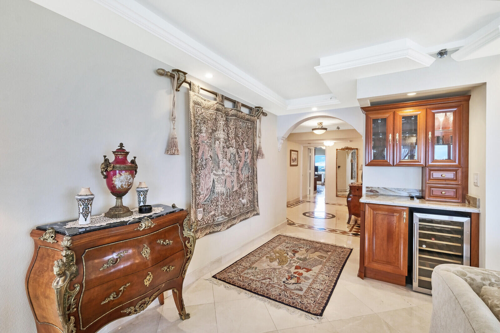 4001 North Ocean Boulevard, Unit B1201 Boca Raton, FL 33431 - Photo 14 of 42 a living room with furniture and a chandelier