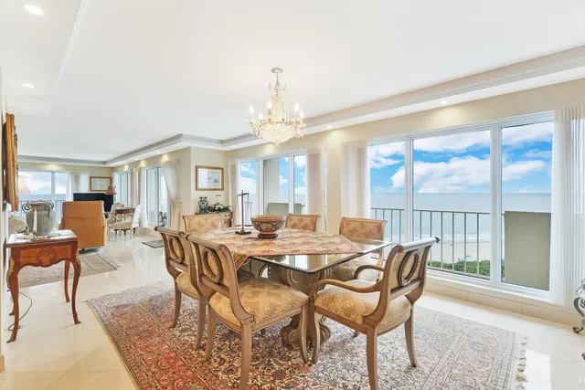 a kitchen with granite countertop a sink cabinets and window