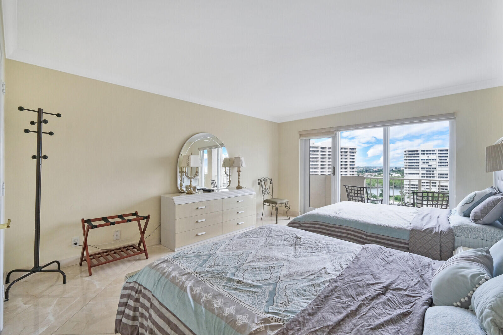 4001 North Ocean Boulevard, Unit B1201 Boca Raton, FL 33431 - Photo 28 of 42 a bedroom with a bed and a large window