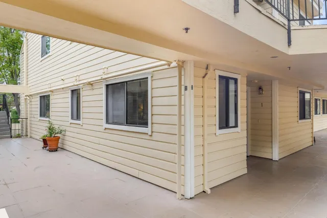 a view of staircase with a rug