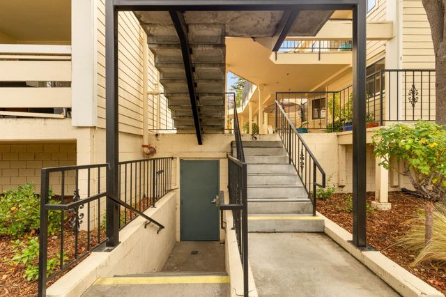 a view of a house with backyard porch and patio