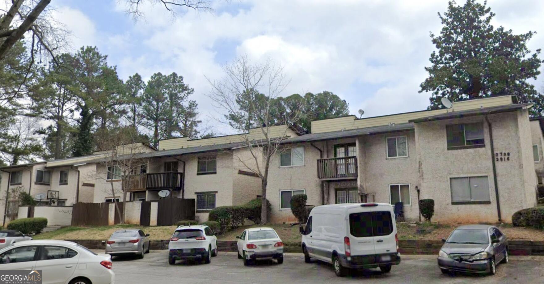 a car parked in front of a house