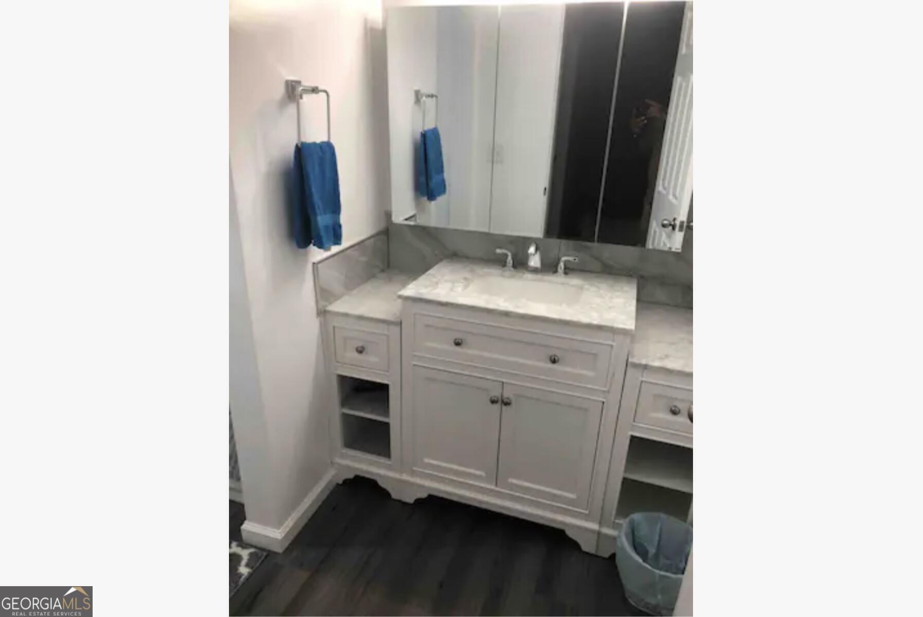 3834 Kensingwood Trace Decatur, GA 30032 - Photo 4 of 26 a bathroom with a sink and a mirror