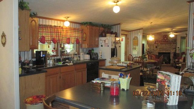 Island in Kitchen! Cabinets GALORE! Pantry! This kitchen is Ready for your Dinners! Gas Stove!