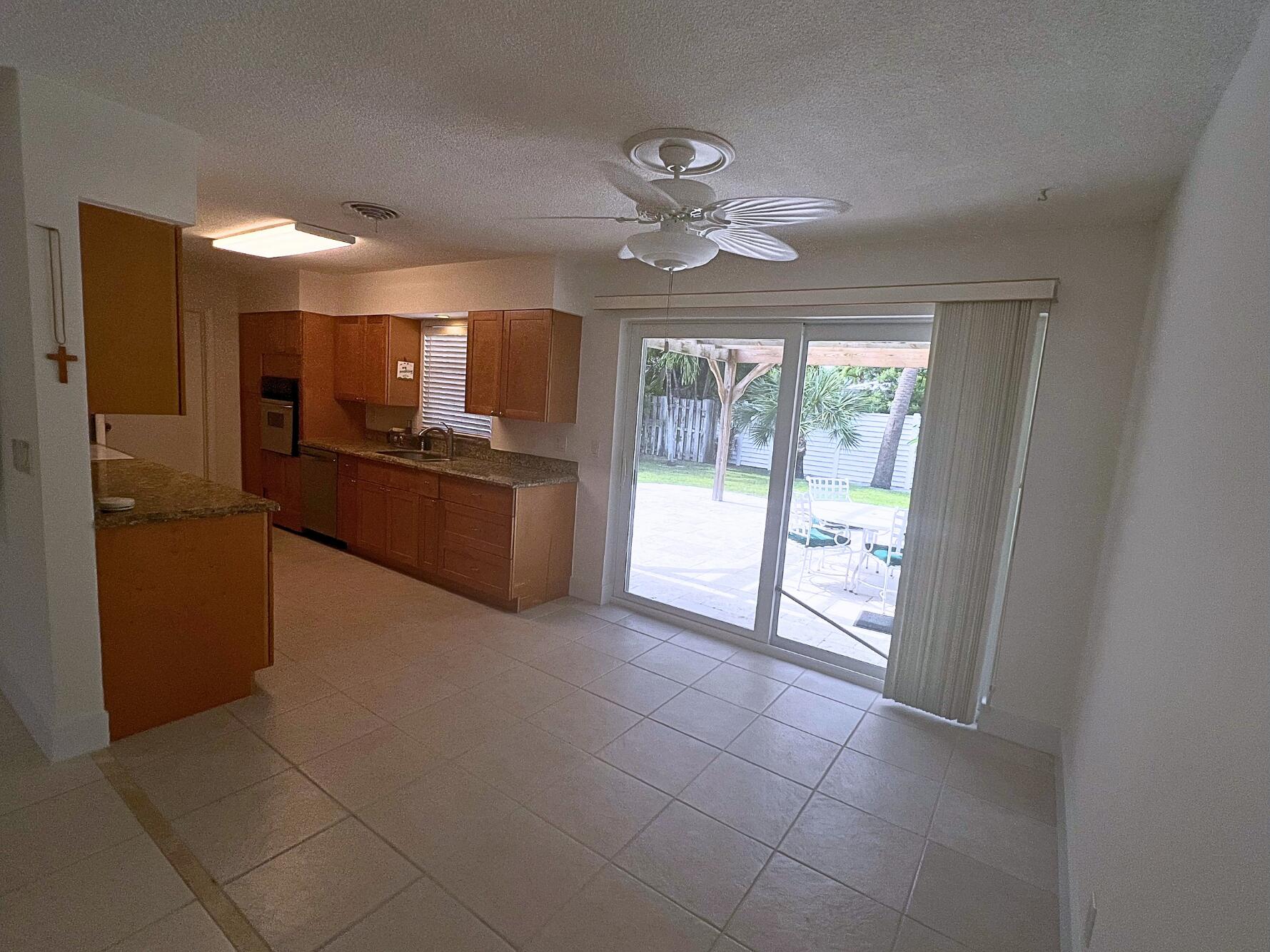 1260 Manor Drive Riviera Beach, FL 33404 - Photo 7 of 56 Dining area looking over patio