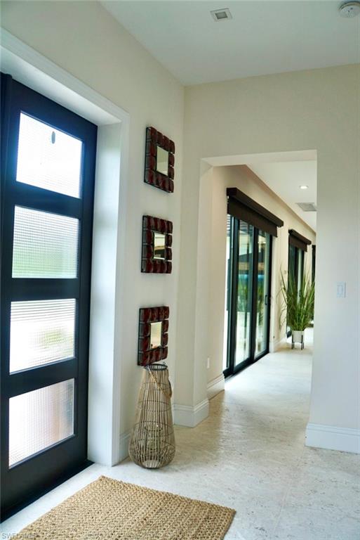 1391 Oakes Boulevard Naples, FL 34119 - Photo 17 of 43 Foyer entrance with plenty of natural light