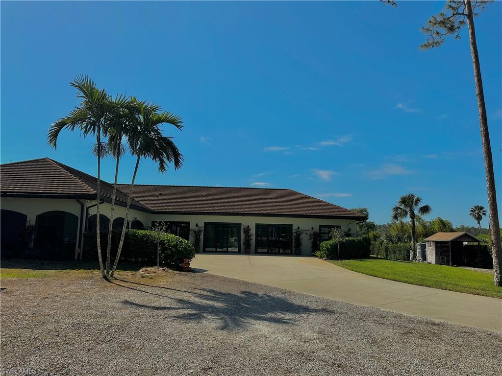1391 Oakes Boulevard Naples, FL 34119 - Photo 41 of 43 Front of the house