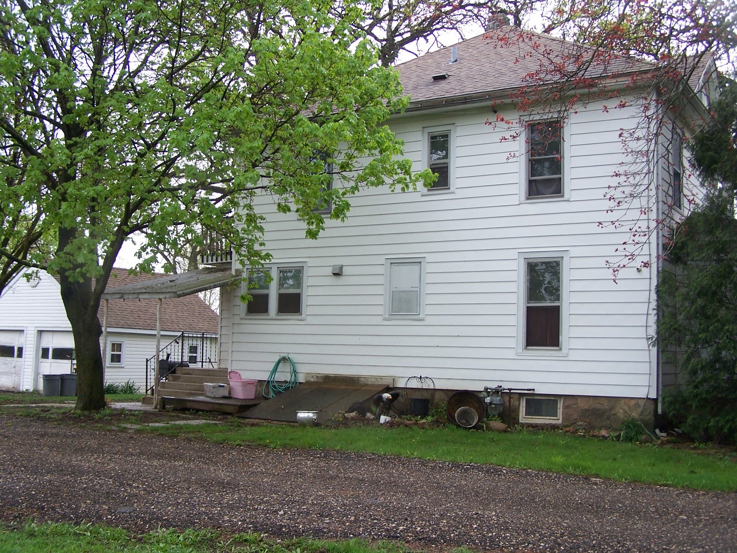 13810 Davis Road Woodstock, IL 60098 - Photo 3 of 13 a front view of a house with a yard