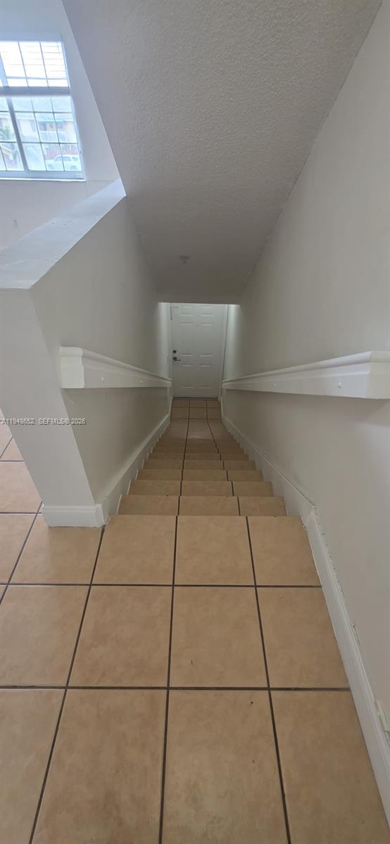 7475 West 22nd Avenue, Unit 206 Hialeah, FL 33016 - Photo 18 of 30 a view of an empty room with a window