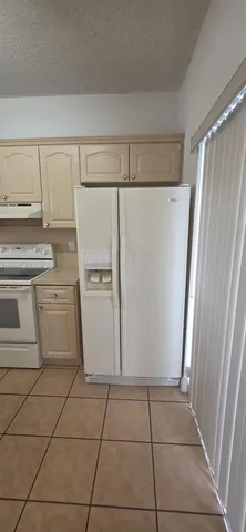 a view of balcony with furniture