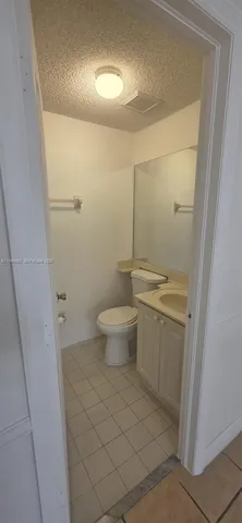 a bathroom with a sink and washing machine