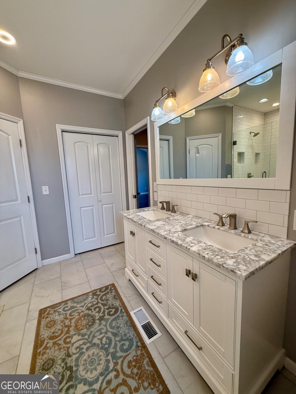 147 Landing Road Cordele, GA 31015 - Photo 12 of 24 a bathroom with a granite countertop sink and a mirror