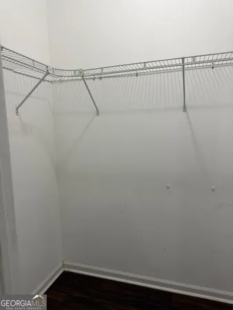 a view of small space with racks on the wall