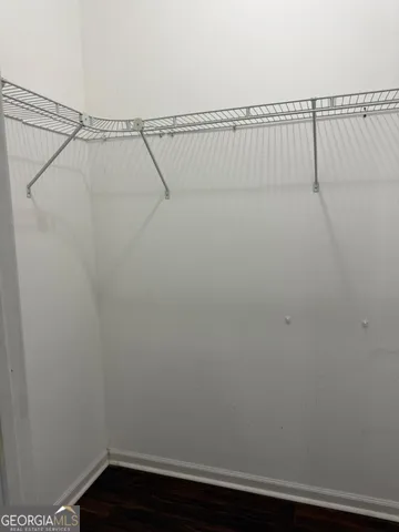 a view of small space with racks on the wall