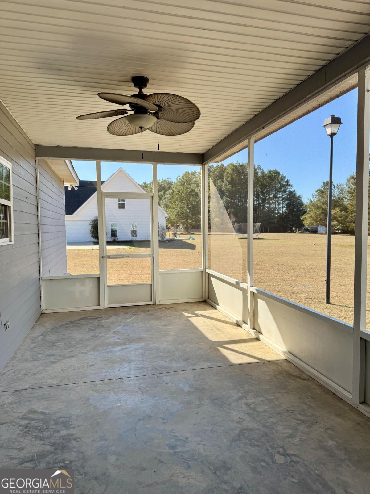 147 Landing Road Cordele, GA 31015 - Photo 19 of 24 a view of a livingroom with a table and chairs