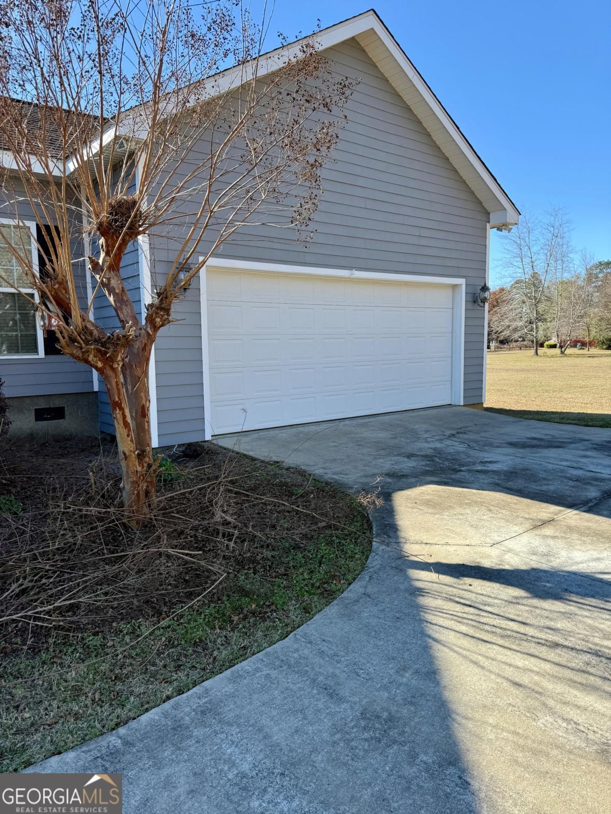 147 Landing Road Cordele, GA 31015 - Photo 22 of 24 a view of a house with a yard
