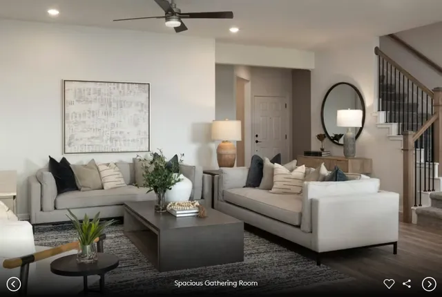 a bedroom with a large bed and a large window