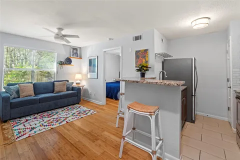 a living room with a couch and a table