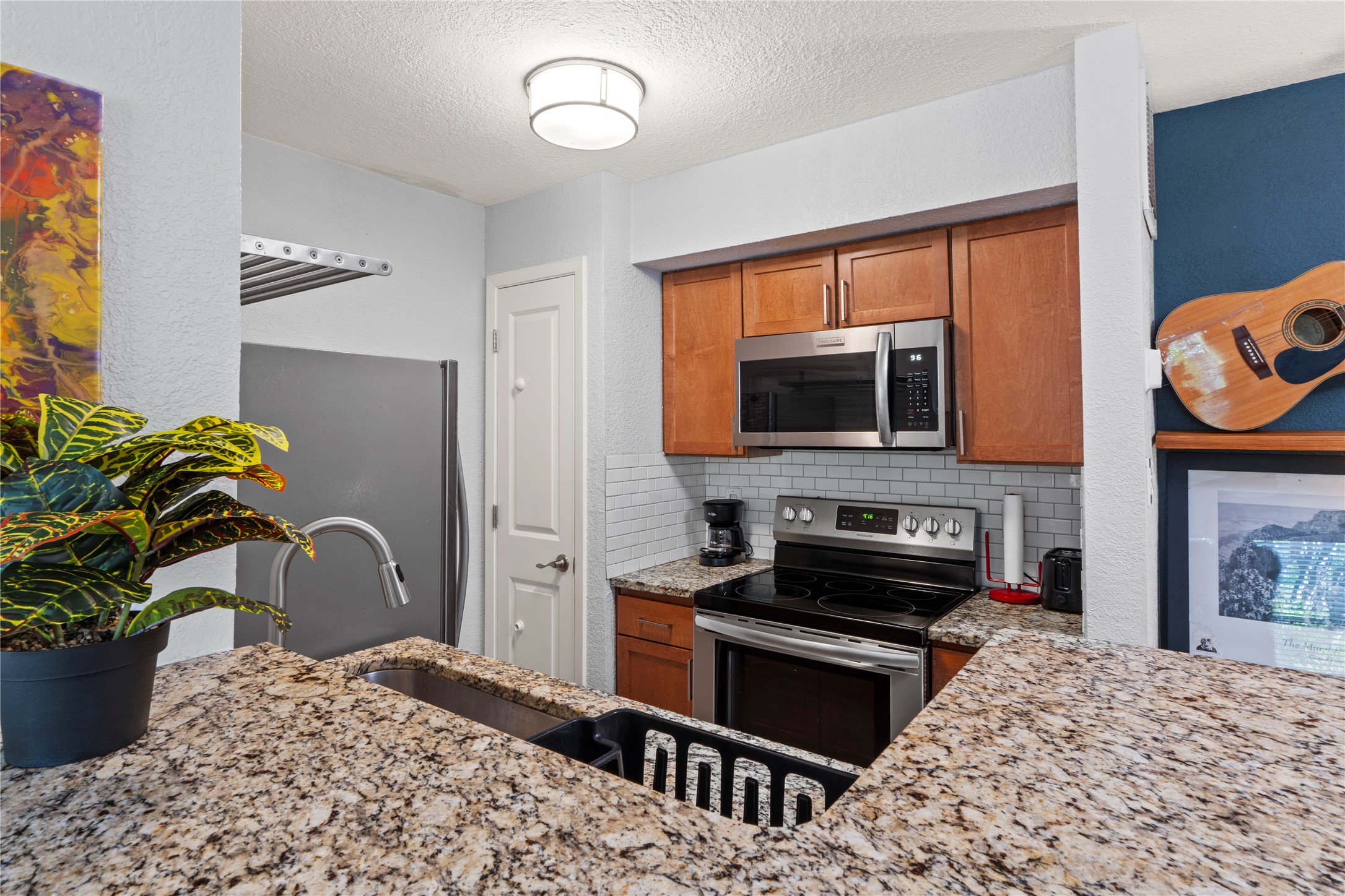 3204 Menchaca Road, Unit 305 Austin, TX 78704 - Photo 14 of 25 Everything you need is here, including a pantry.