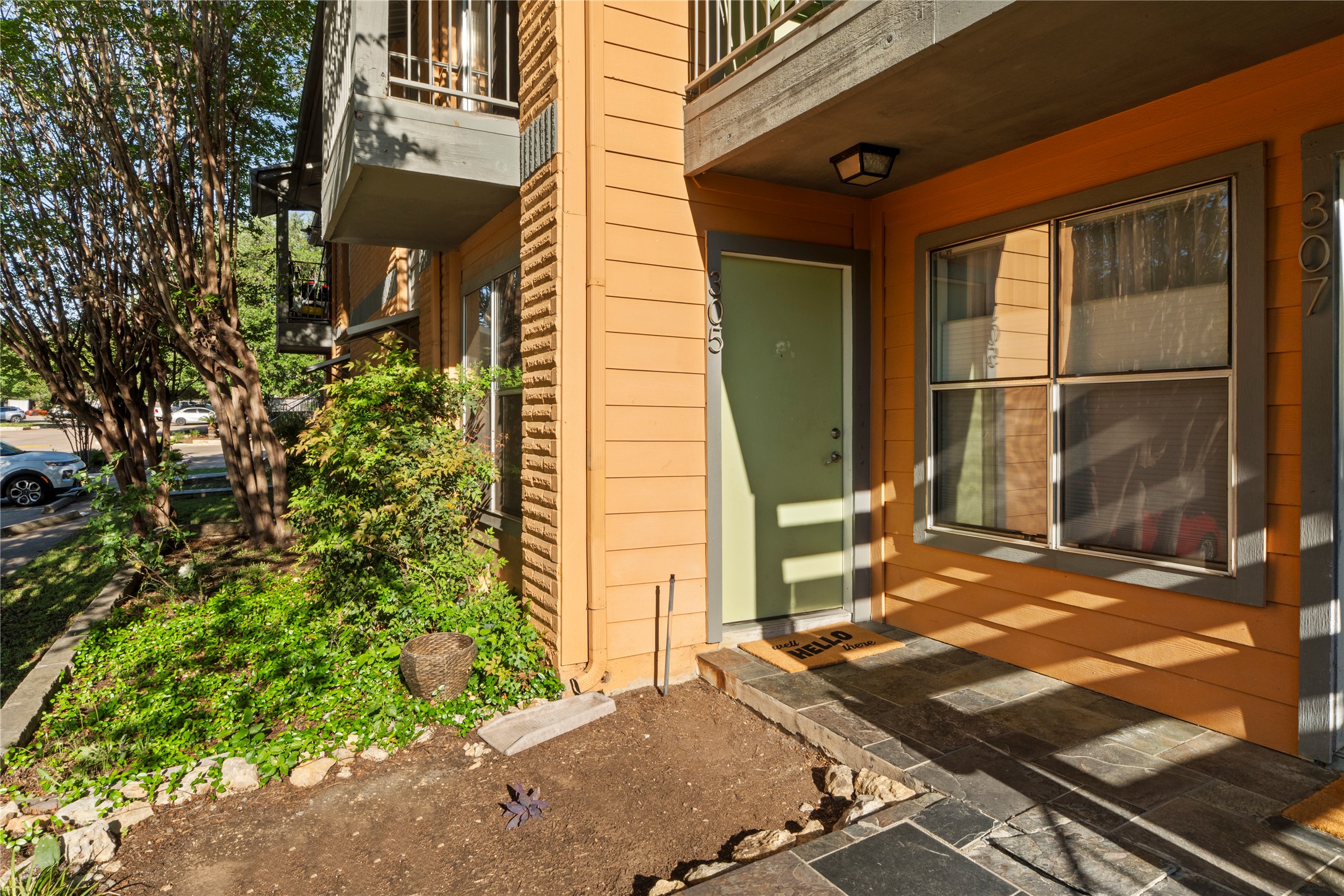 3204 Menchaca Road, Unit 305 Austin, TX 78704 - Photo 2 of 25 First floor unit up a very short flight of stairs.