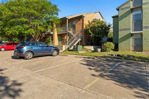 a car parked in front of a house