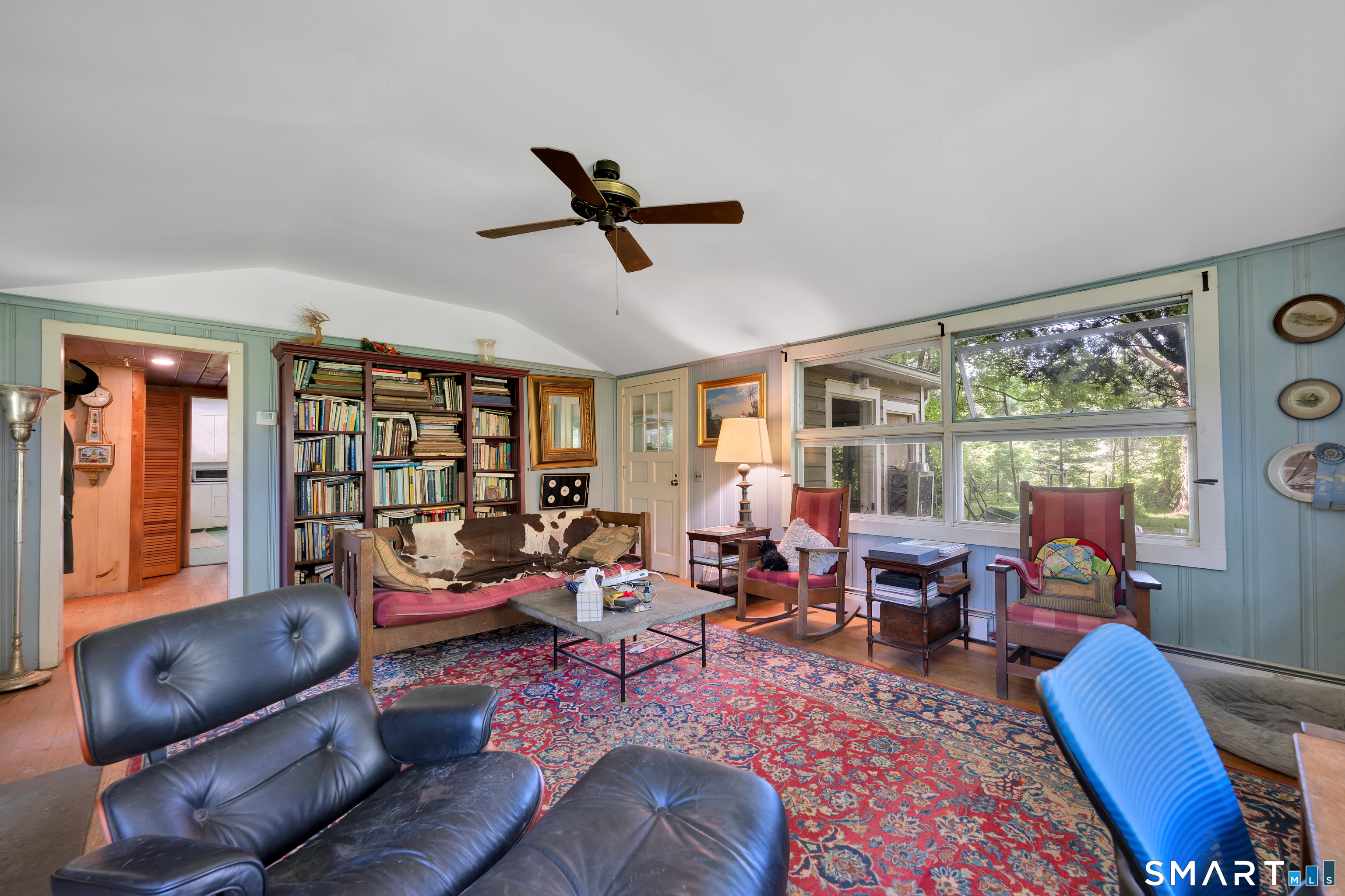 231 B Kent Road Kent, CT 06757 - Photo 10 of 35 a living room with furniture and a large window