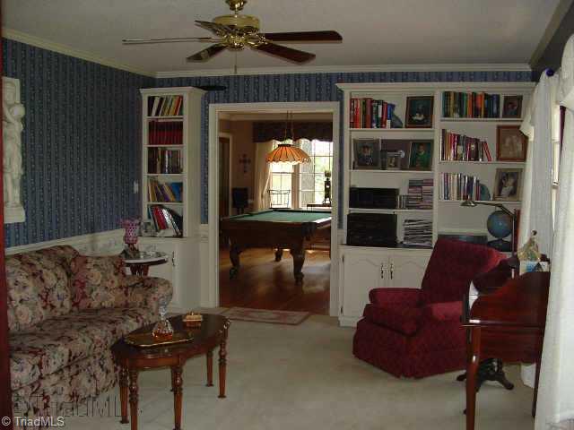 2514 Shady Grove Church Road Staley, NC 27355 - Photo 2 of 9 Other. Formal living room/library with built-in shelving. View of formal dining room currently used as a billiard room.