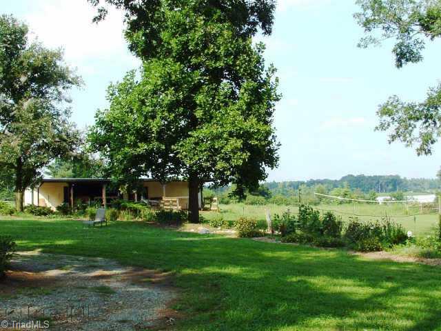 2514 Shady Grove Church Road Staley, NC 27355 - Photo 8 of 9 Other. Barn with carport and large tack room