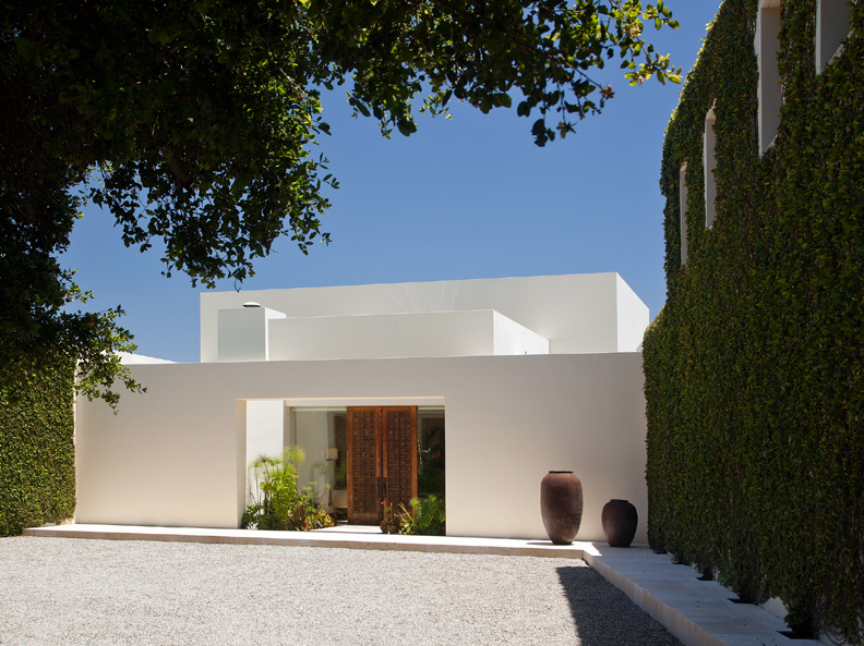 356 Woodley Road Montecito, CA 93108 - Photo 2 of 17 a front view of a house with garden