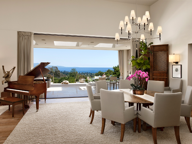356 Woodley Road Montecito, CA 93108 - Photo 4 of 17 a view of a dining room with furniture a chandelier and wooden floor