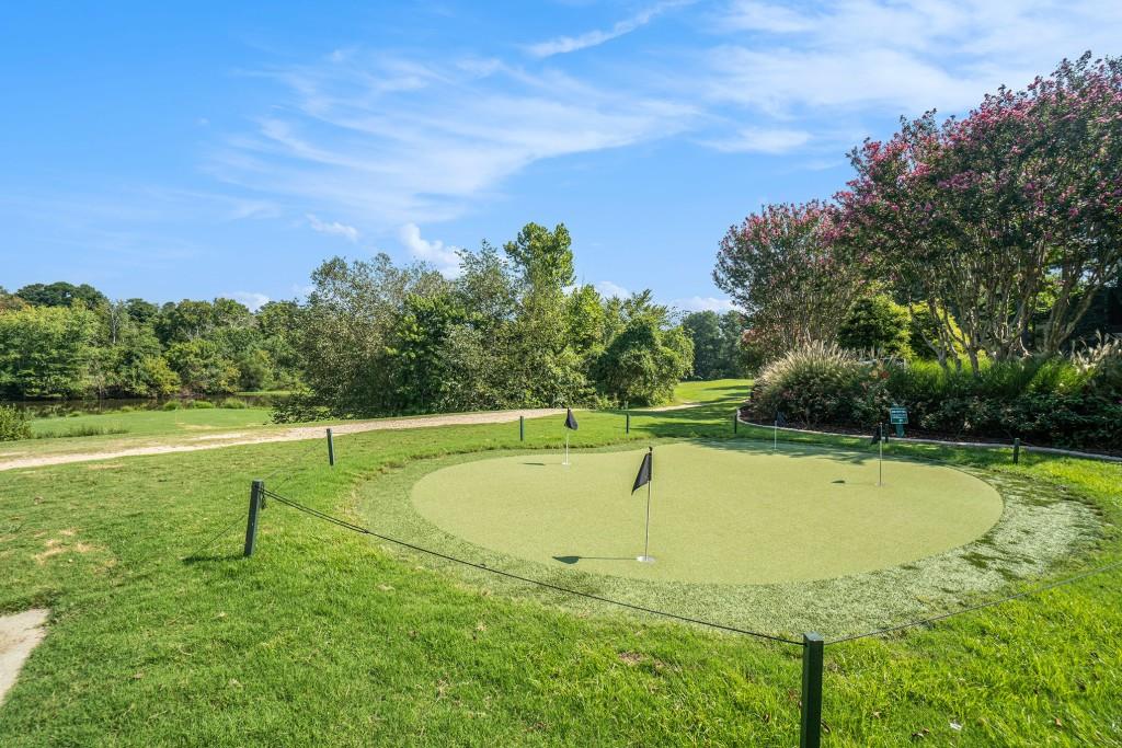 46 La Rue Place Northwest Atlanta, GA 30327 - Photo 21 of 28 a view of a swimming pool with a yard