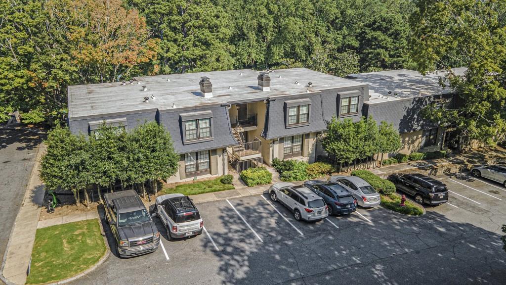 46 La Rue Place Northwest Atlanta, GA 30327 - Photo 6 of 28 a view of a front of house with a yard