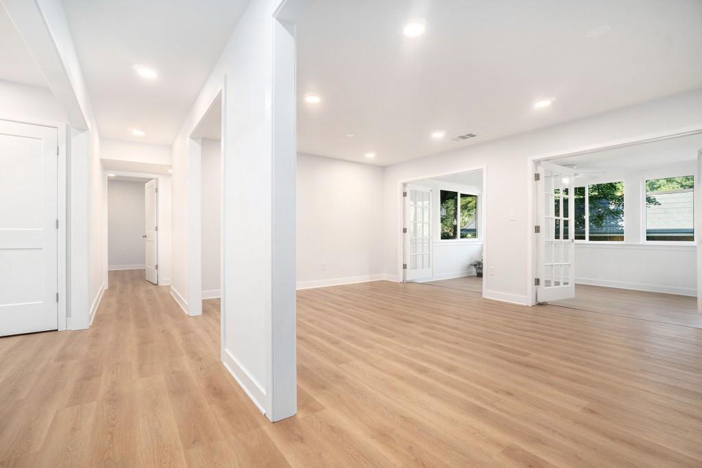 46 La Rue Place Northwest Atlanta, GA 30327 - Photo 8 of 28 a view of an empty room and wooden floor