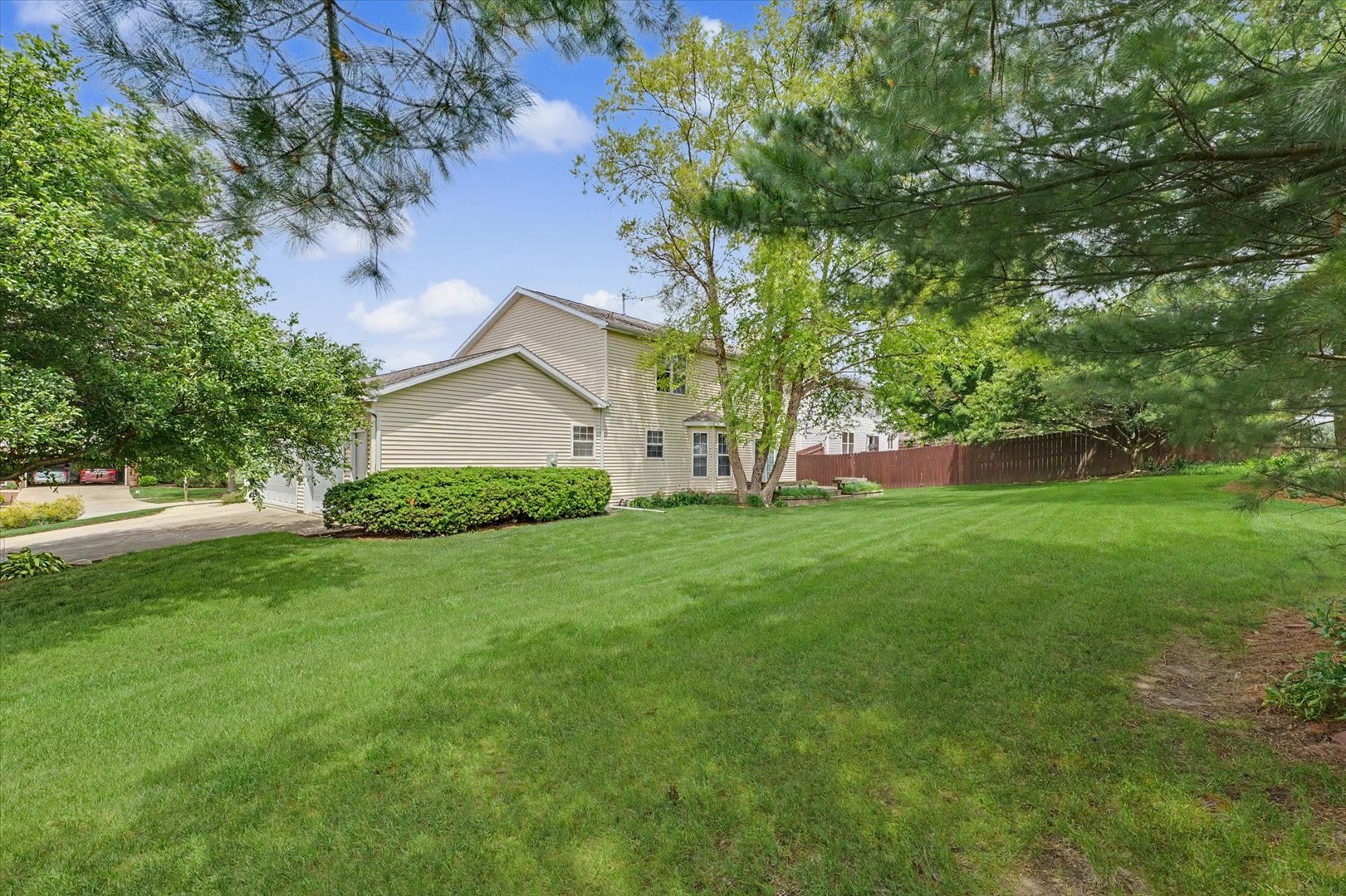 4409 Copper Ridge Road Champaign, IL 61822 - Photo 36 of 40 a view of a house with a yard