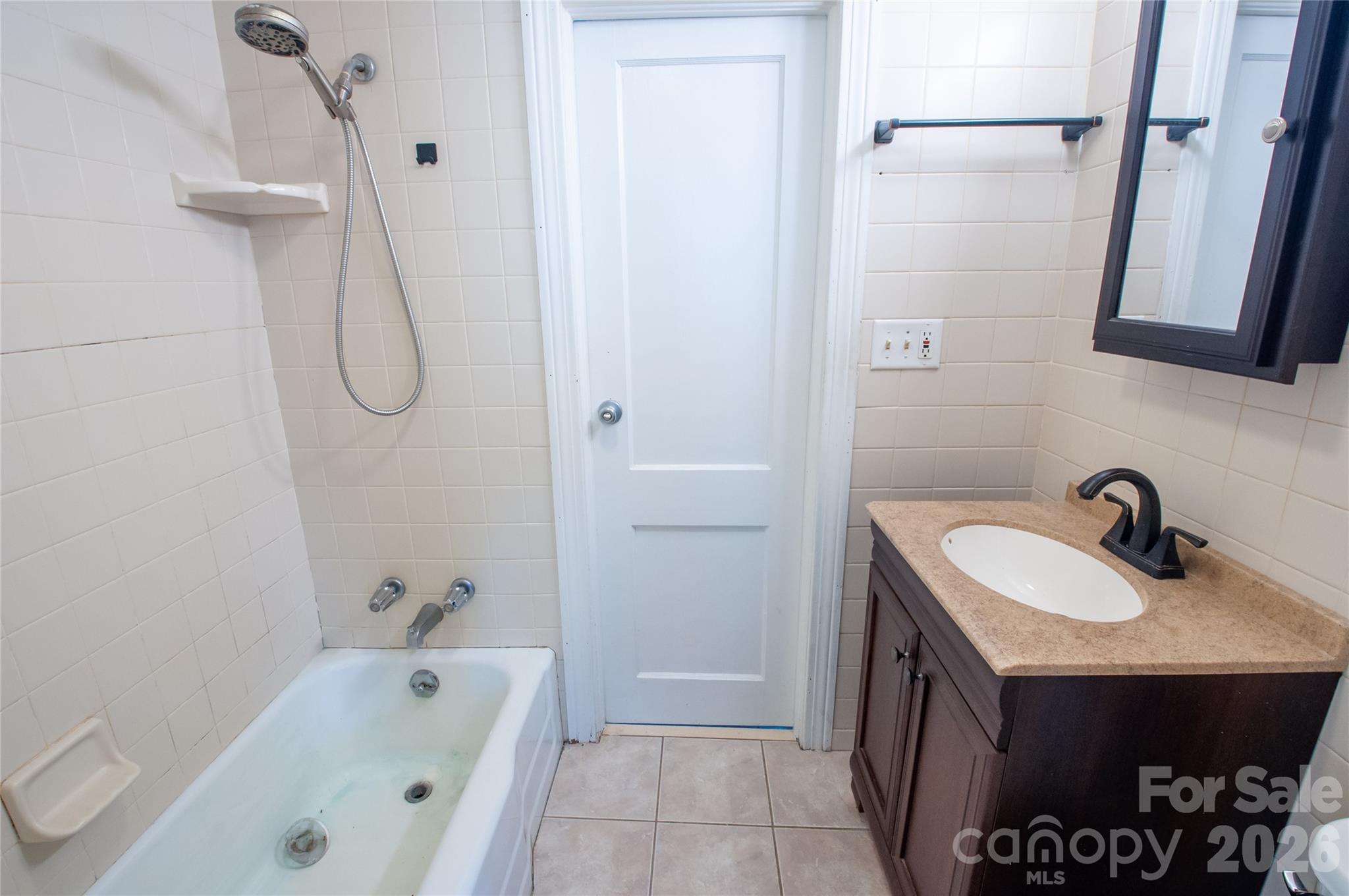 127 Bristol Road Statesville, NC 28677 - Photo 5 of 10 a bathroom with a sink a toilet and shower