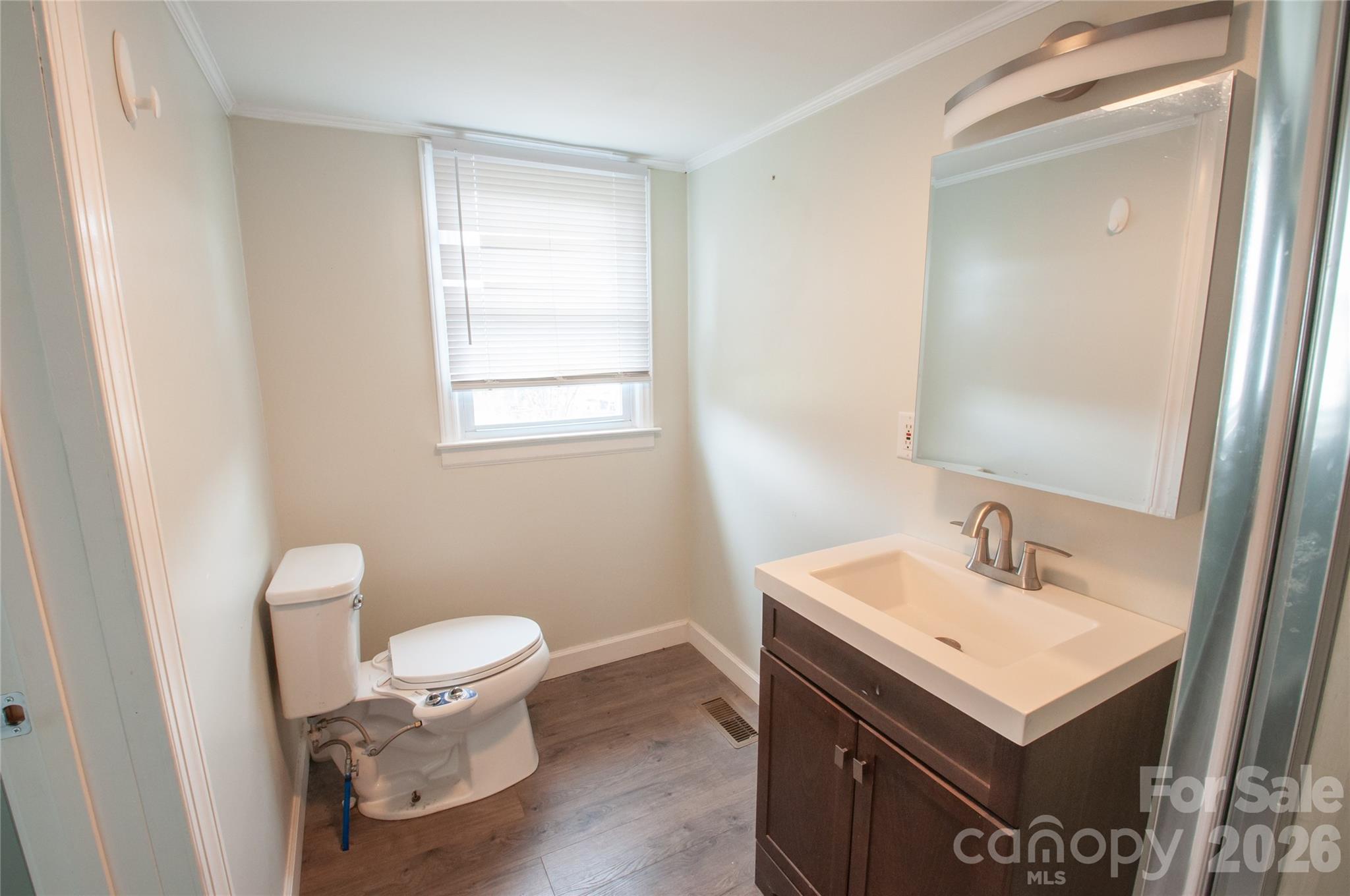127 Bristol Road Statesville, NC 28677 - Photo 8 of 10 a bathroom with a sink toilet and vanity