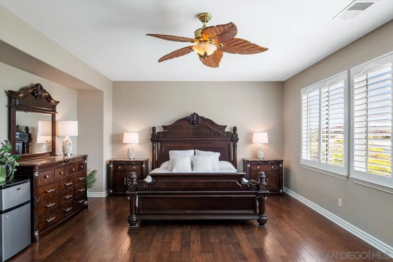 565 Hidden Trails Road Escondido, CA 92027 - Photo 27 of 52 a living room with furniture and a window