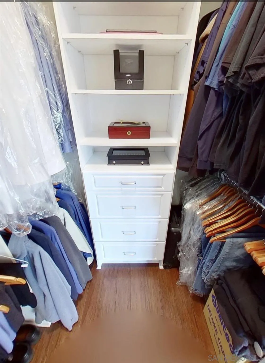 565 Hidden Trails Road Escondido, CA 92027 - Photo 32 of 52 a view of walk in closet with clothes and shoes
