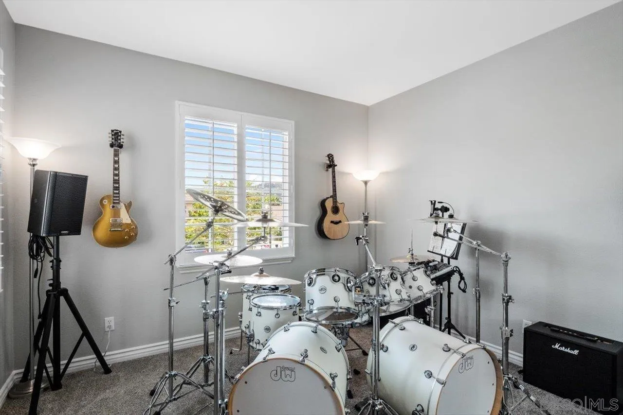 565 Hidden Trails Road Escondido, CA 92027 - Photo 42 of 52 a gym room with furniture and a window