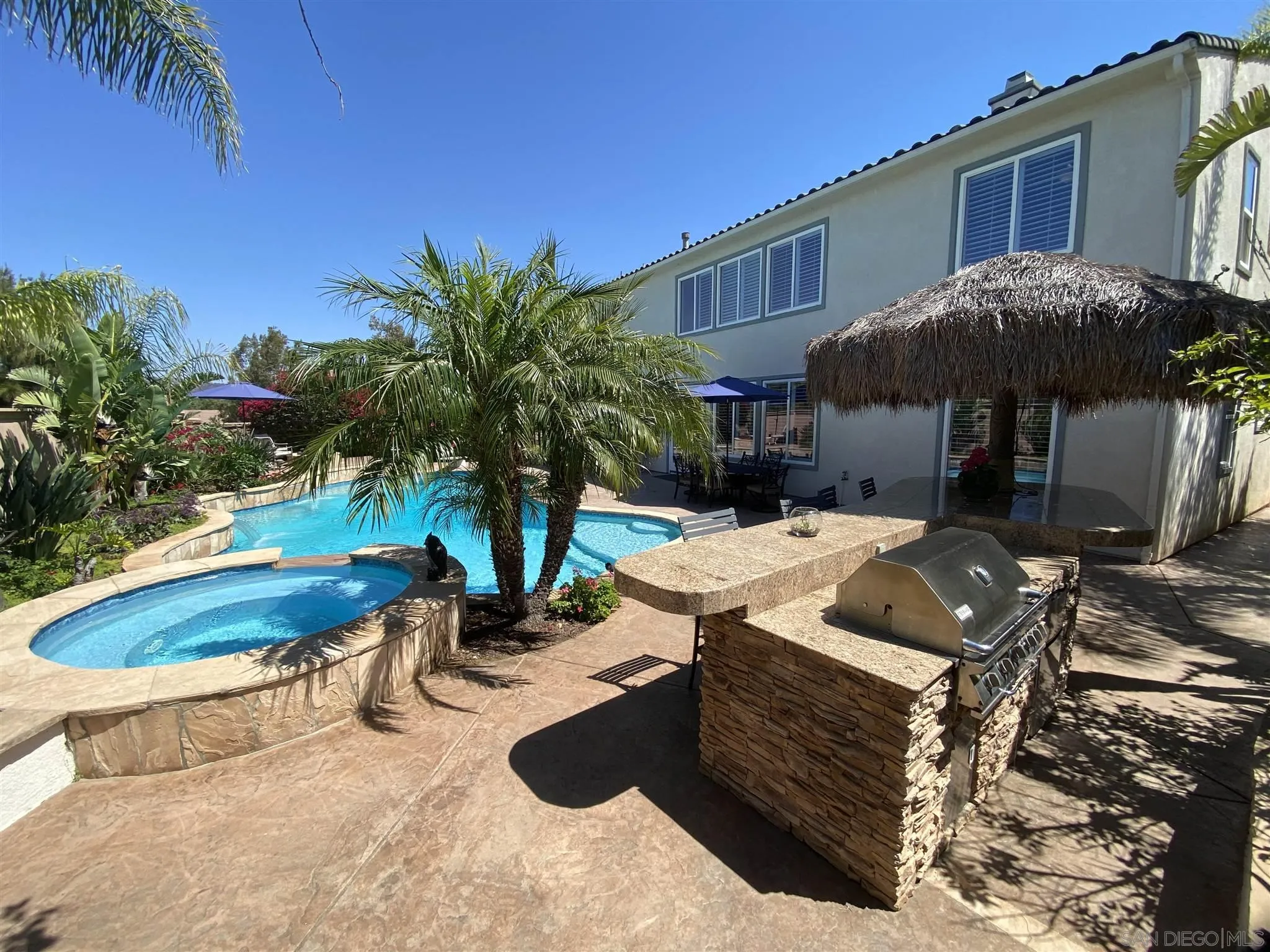 565 Hidden Trails Road Escondido, CA 92027 - Photo 51 of 52 a view of a backyard with plants and patio