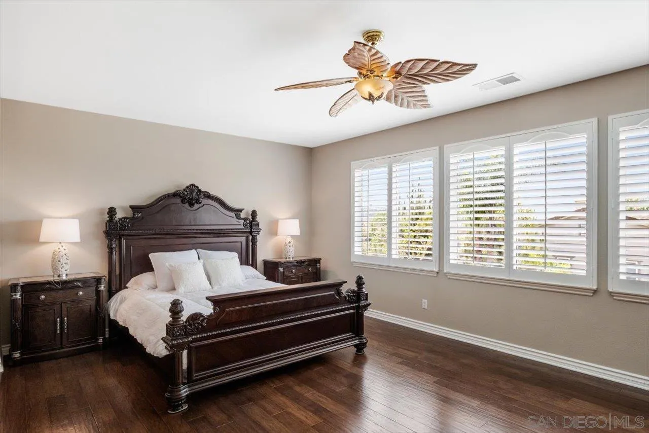 565 Hidden Trails Road Escondido, CA 92027 - Photo 9 of 52 a bedroom with bed and a window