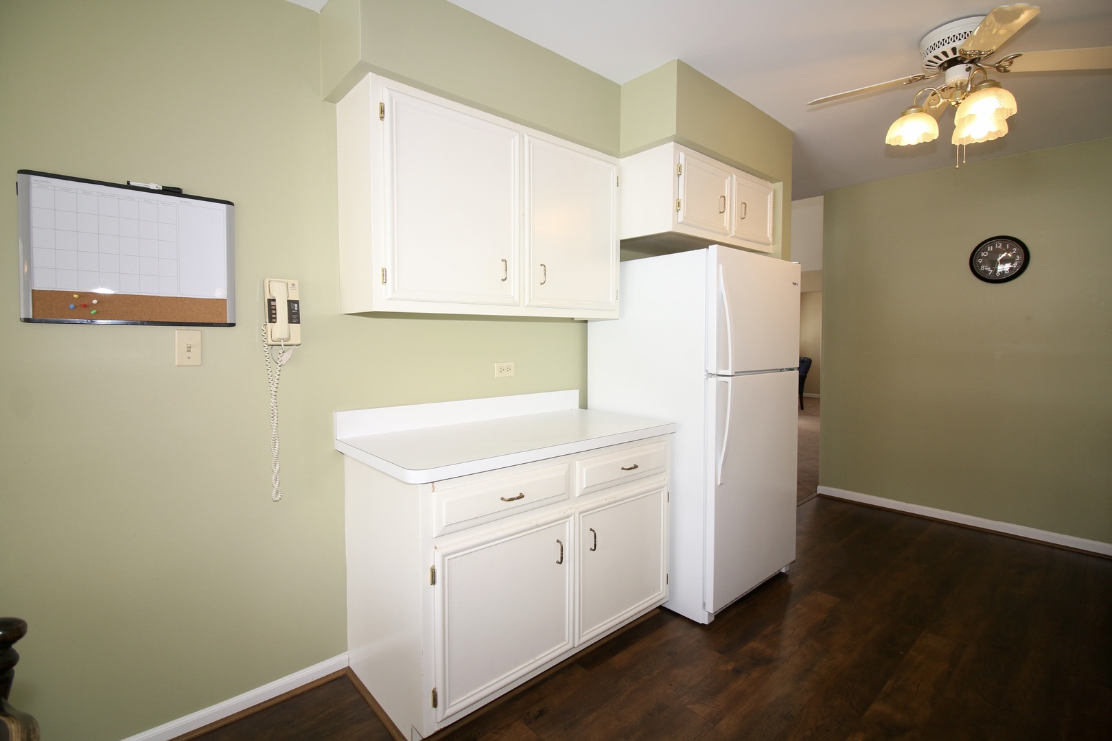 19213 Weber Road Mokena, IL 60448 - Photo 13 of 36 a white refrigerator freezer sitting inside of a kitchen