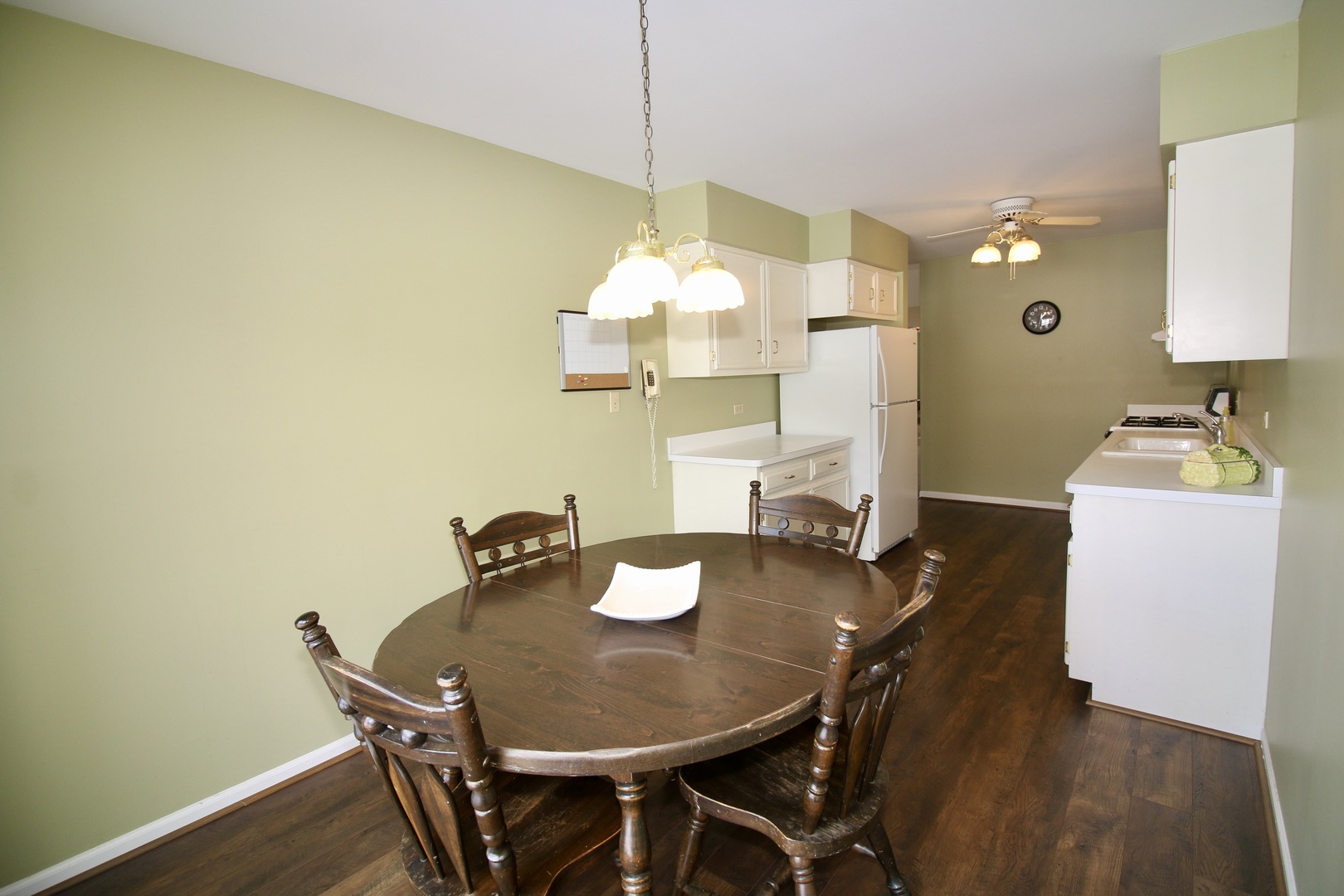 19213 Weber Road Mokena, IL 60448 - Photo 14 of 36 a dining room with furniture and wooden floor