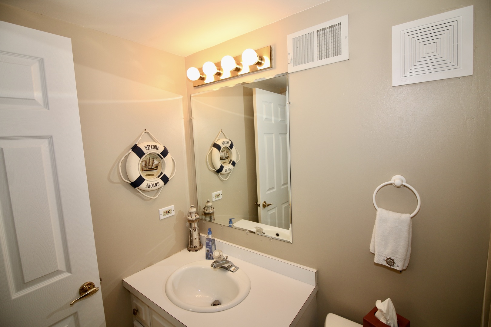 19213 Weber Road Mokena, IL 60448 - Photo 30 of 36 a bathroom with a sink and mirror