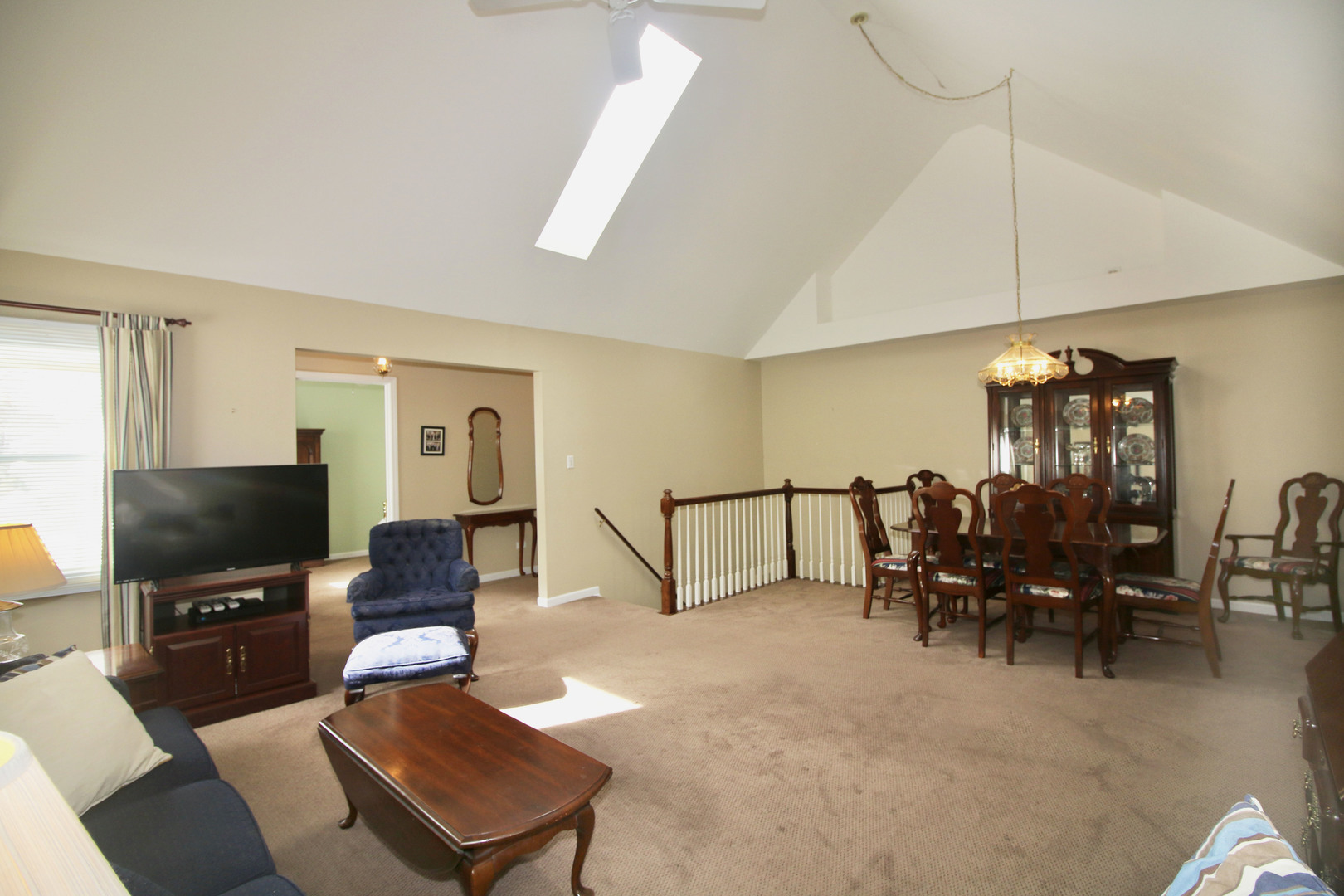 19213 Weber Road Mokena, IL 60448 - Photo 9 of 36 a living room with furniture and a flat screen tv