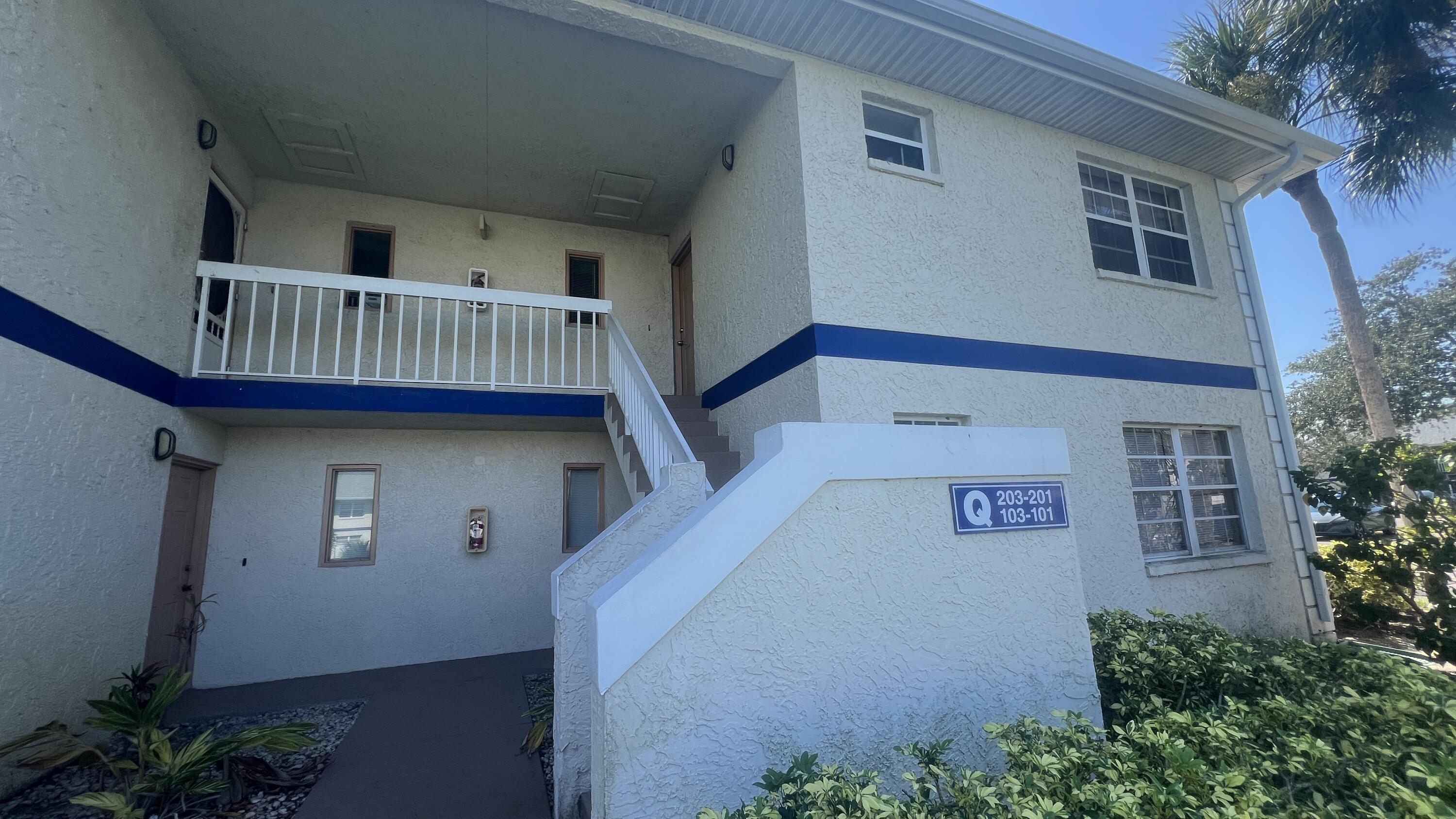 1524 Southeast Royal Green Circle, Unit 101 Port St. Lucie, FL 34952 - Photo 1 of 26 Front of Building