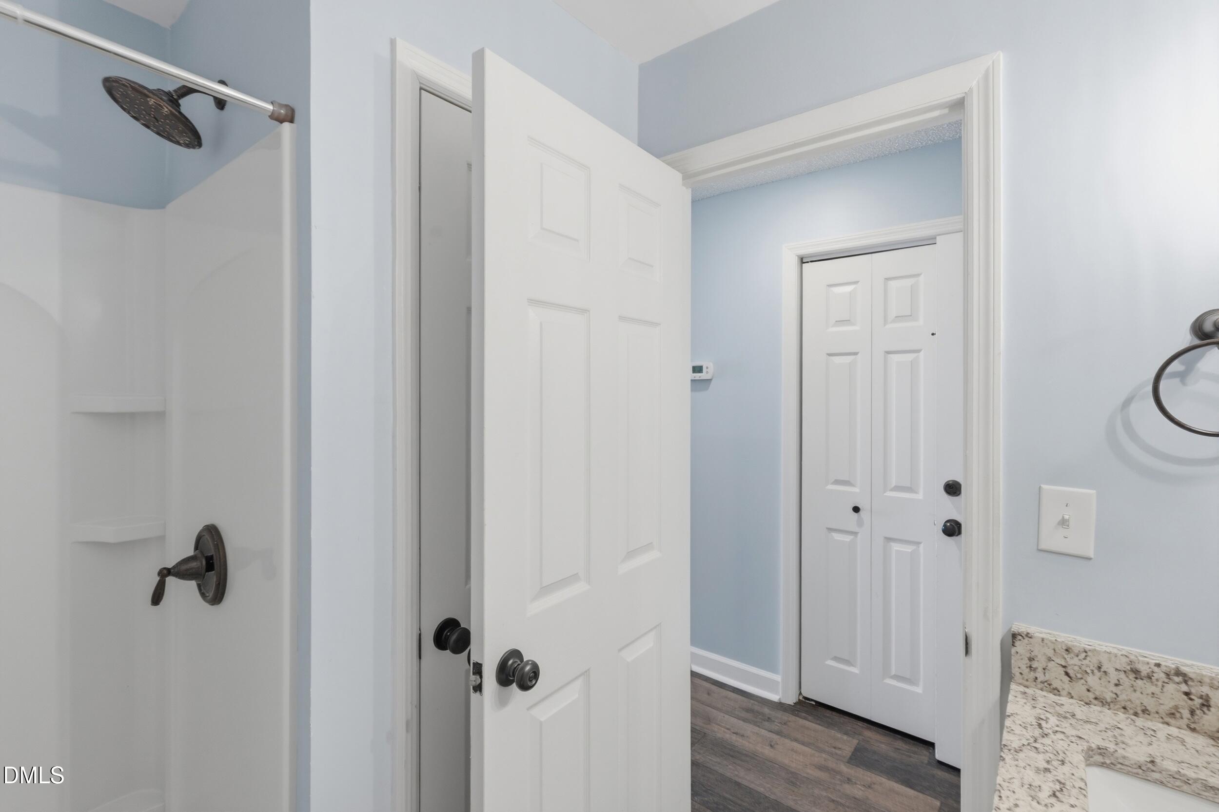 790 New River Inlet Road, Unit 114A North Topsail Beach, NC 28460 - Photo 10 of 46 a bathroom with a shower